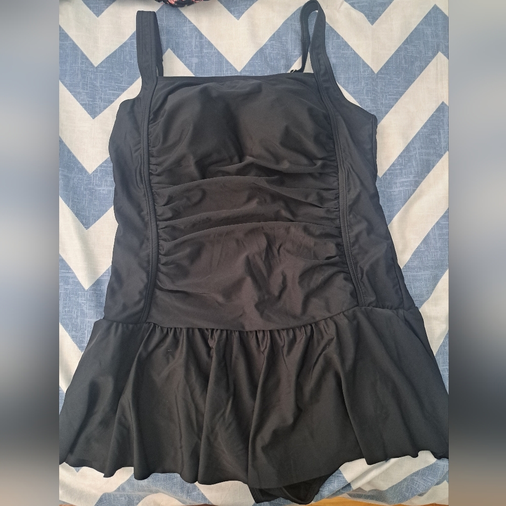 One piece black ruched bathing suit with attached skirt size Large